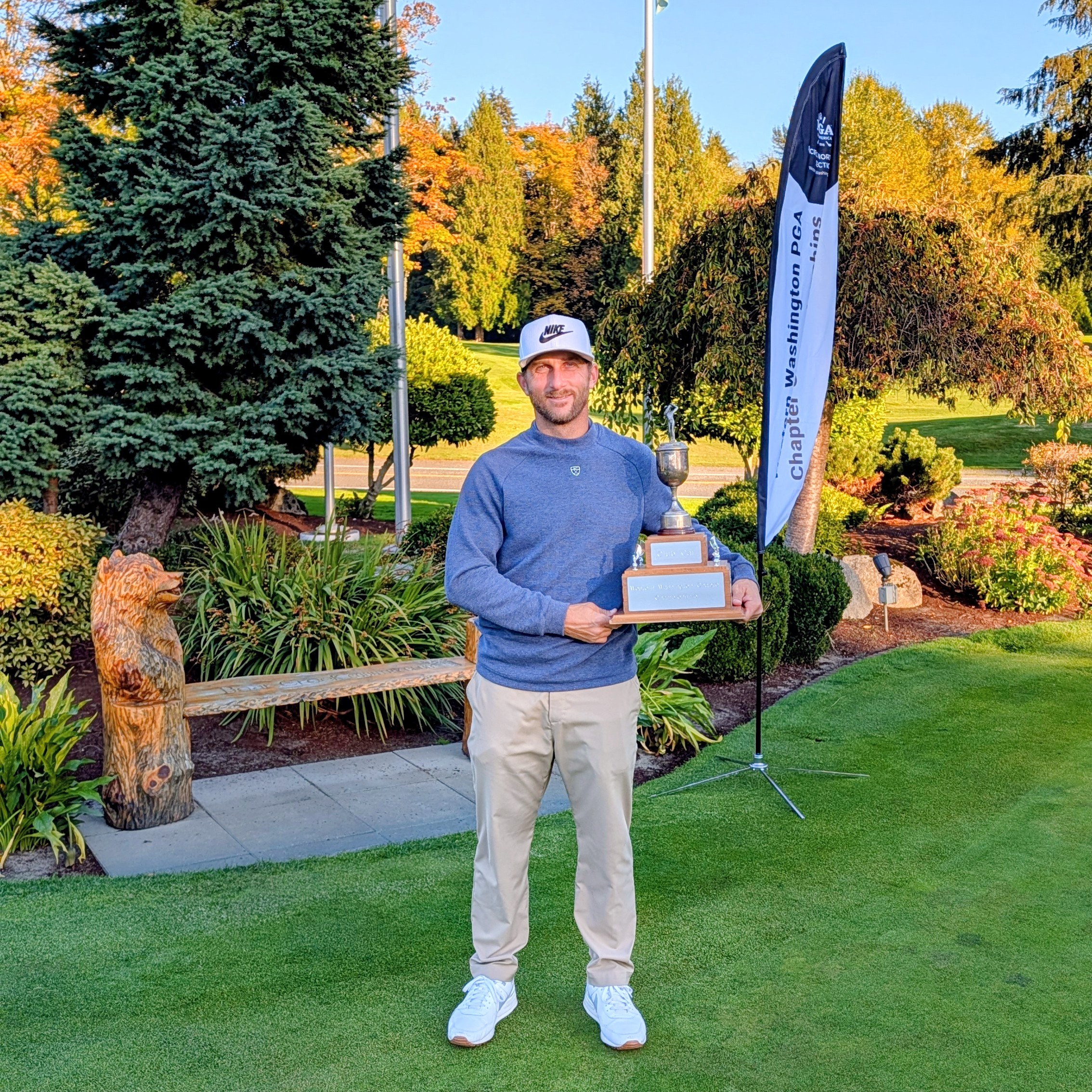 Derek Berg with championship trophy